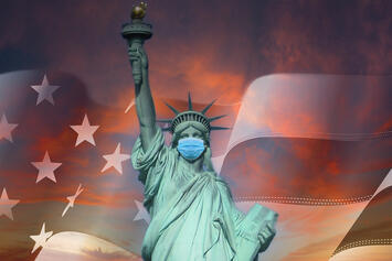 Lady_Liberty_under_a_cloudy-sunset.jpg