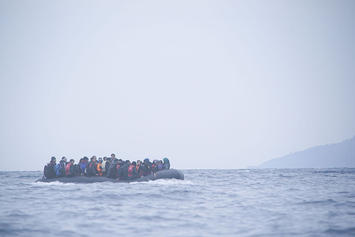 Refugees_on_a_boat_crossing_the_Mediterranean_sea,_heading_from_Turkish_coast_to_the_northeastern_Greek_island_of_Lesbos,_29_January_2016.jpg