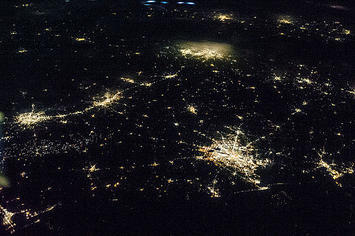 ISS-36_Oblique_nighttime_image_of_the_four_largest_metropolitan_areas.jpg