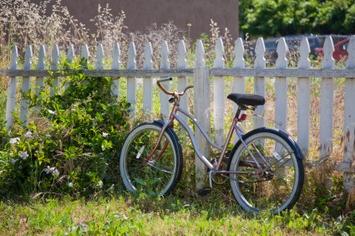 bicycle on picket fence - iStock_000010242185XSmall.jpg