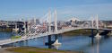 Tilikum_Crossing_with_streetcar_and_MAX_train_in_2016.jpg