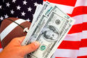 football, dollars, flag -iStock_000010427175XSmall.jpg